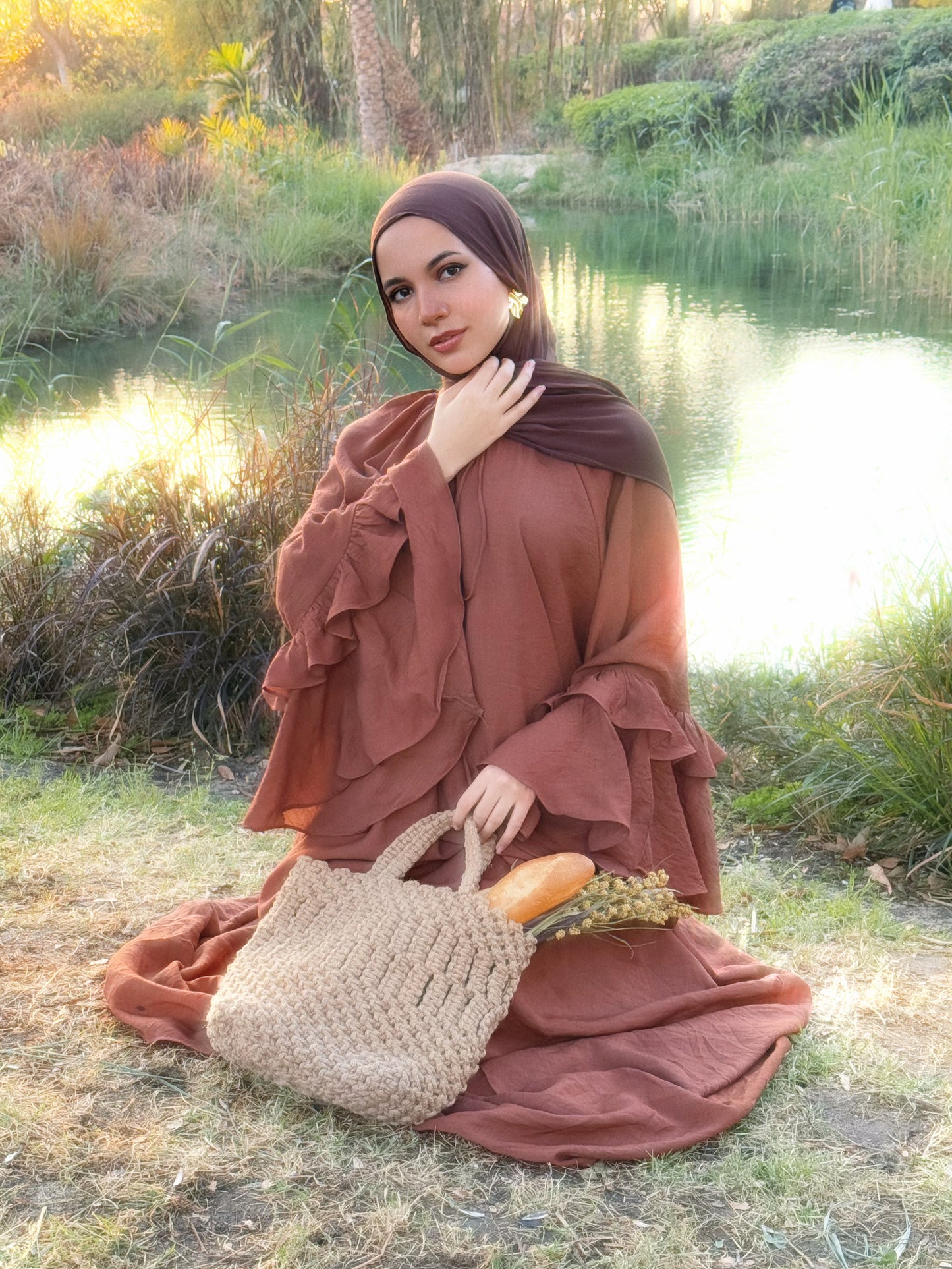 Linen-blend flounced dress with a belt